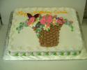 Beautiful cake with basket of flowers