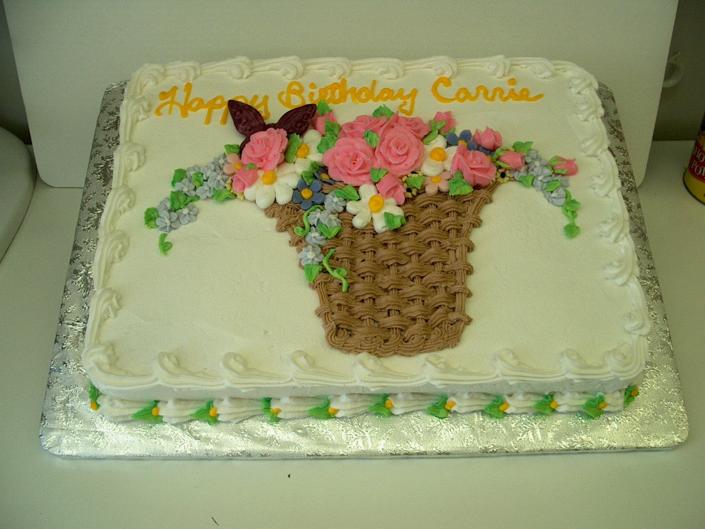 Beautiful cake with basket of flowers